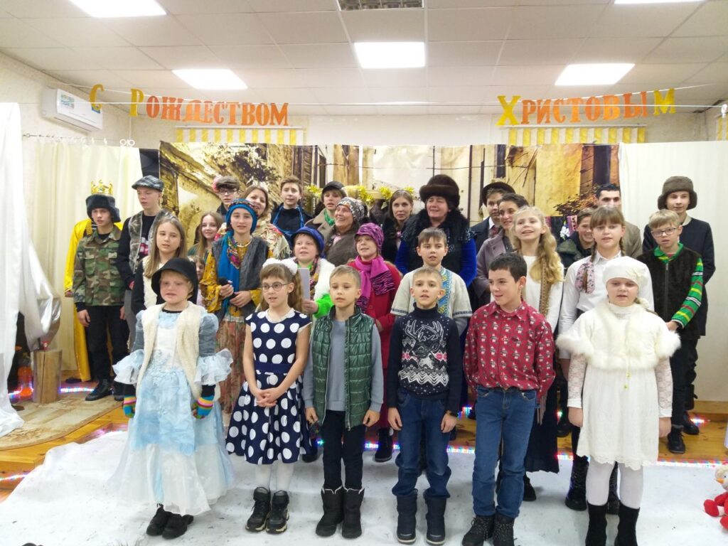 Children sing during a concert at the church.